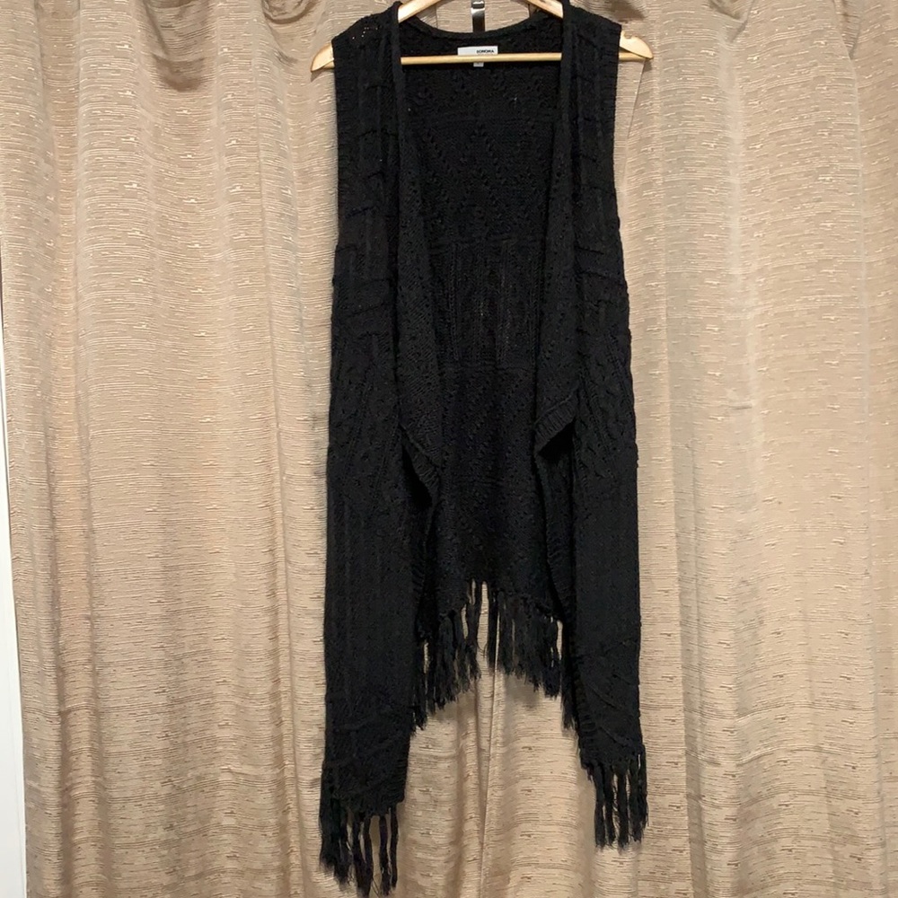 Long charcoals gray sweater vest with fringe.